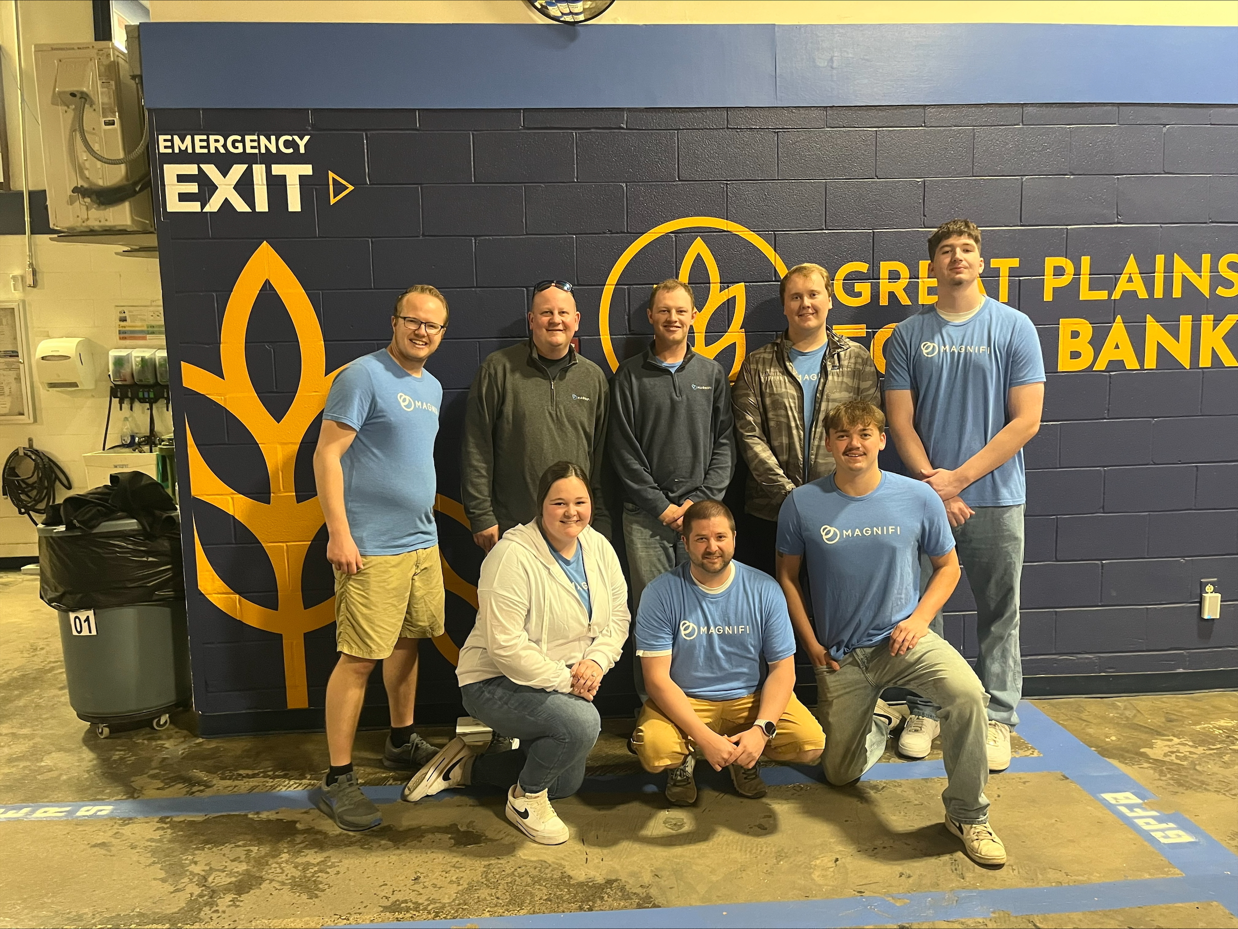 Magnifi team members happily volunteering.