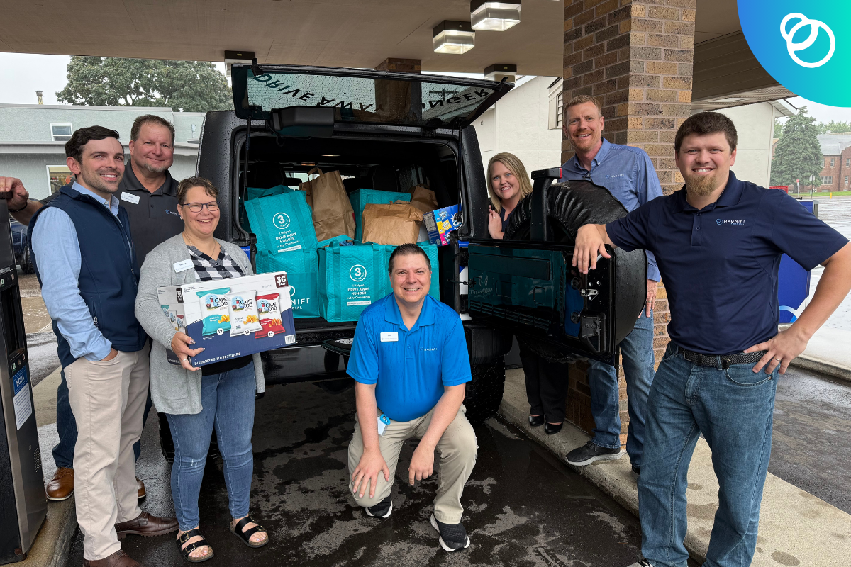 Magnifi Filling The Jeep with Donations