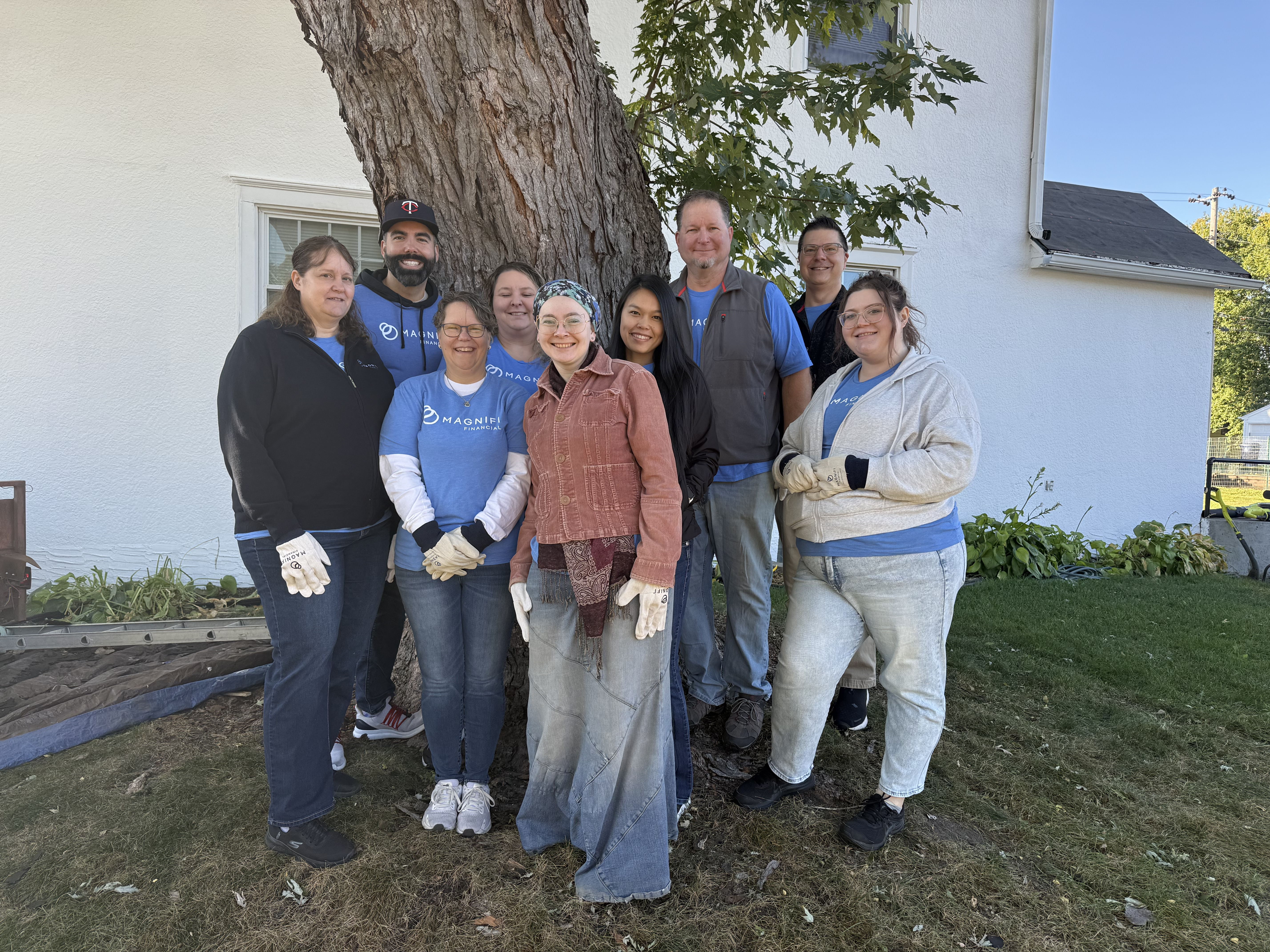 Magnifi team members happily volunteering.