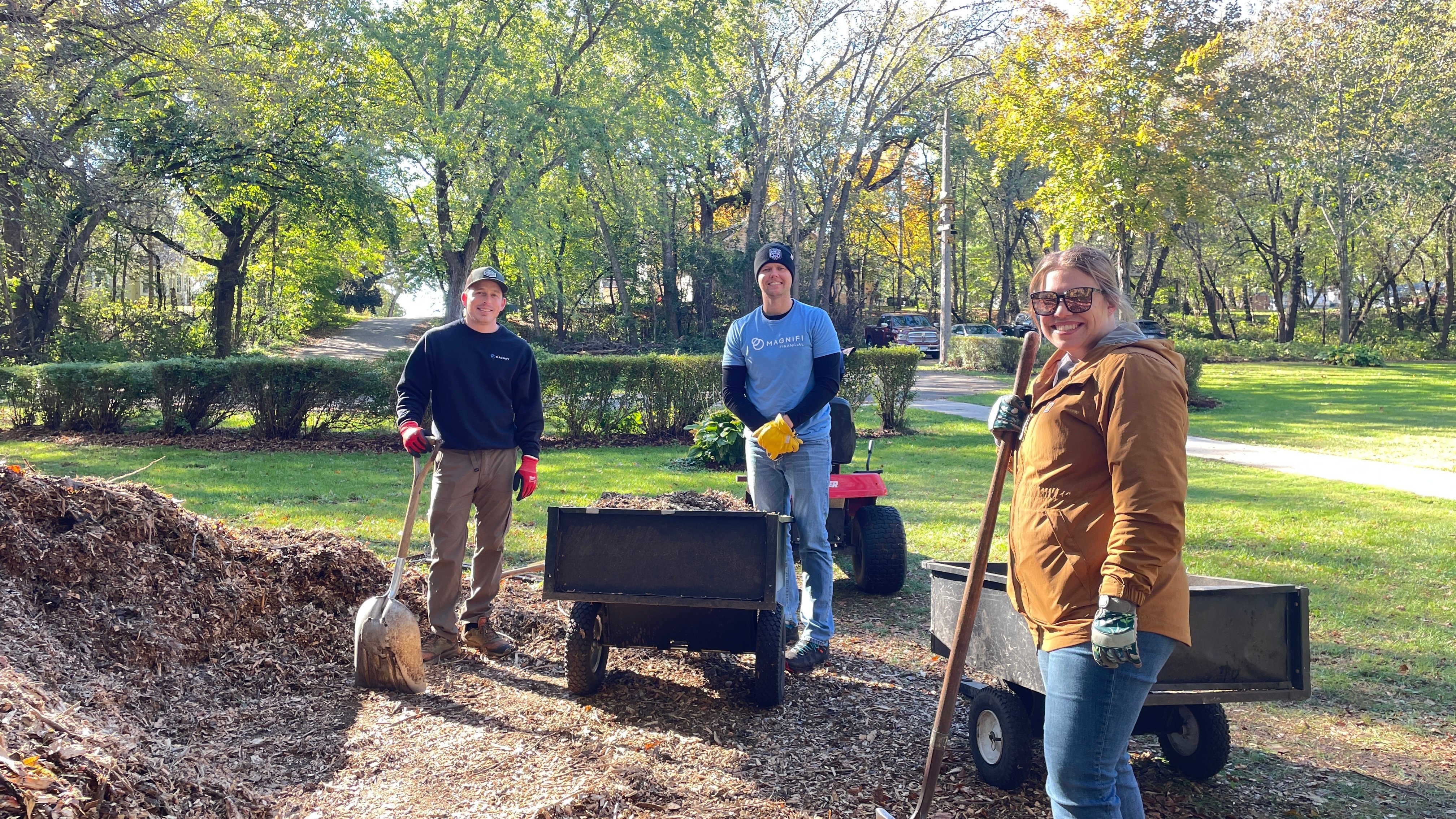 Magnifi team members happily volunteering.