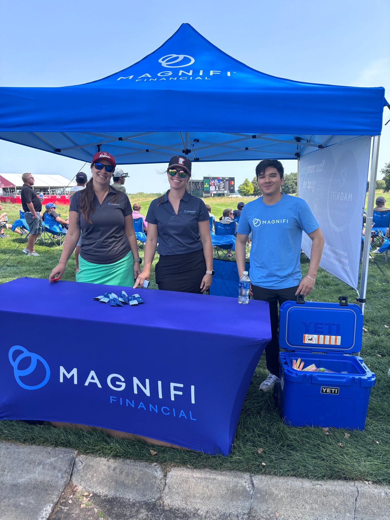Magnifi Staff handing out Freezies on Hole 12