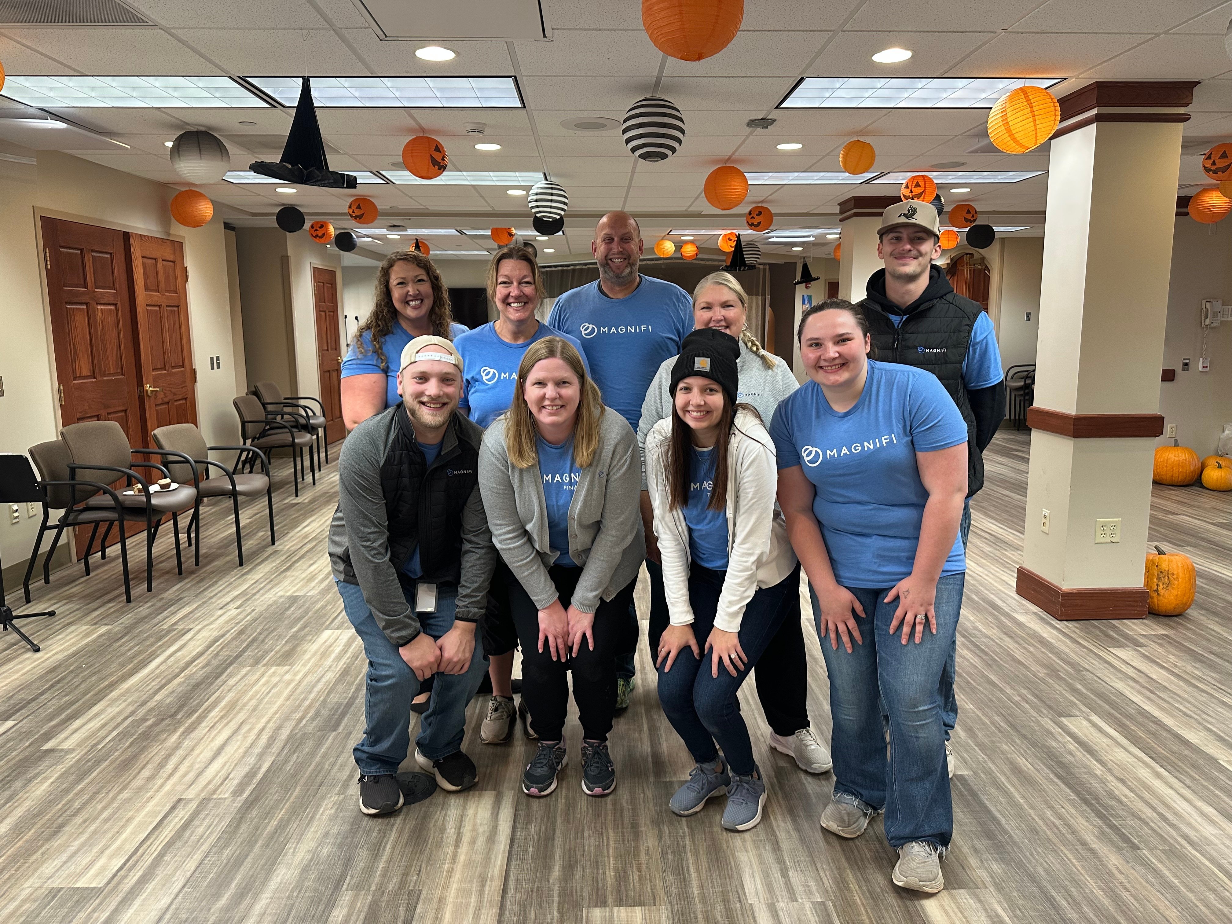 Magnifi team members happily volunteering.